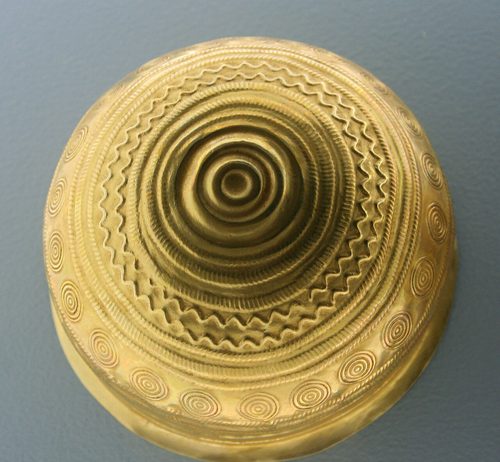 Replica of a decorated gold bowl from Eberswalde, seen from below.