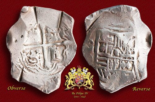 A silver eight-real cob struck at Mexico City under Philip IV, cut and hammered by hand.