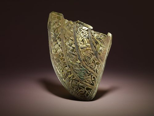 Silver-gilt cheek-piece from the Staffordshire helmet, decorated with interlaced animals.