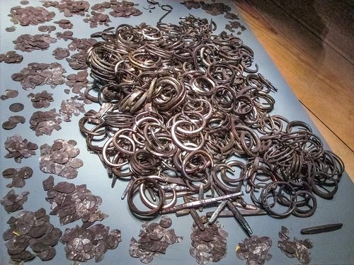Arm-rings and Islamic coins from the second silver deposit of the Spillings hoard, Gotlands Museum, Visby.