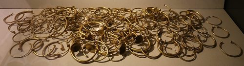 Replicas of lost bracelets and ingots melted down after the 1854 discovery. National Museum of Ireland.