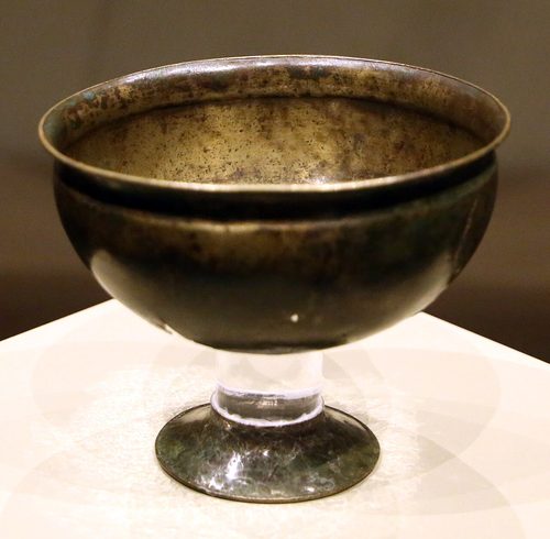 The plain copper-alloy stemmed cup found with the chalice. National Museum of Ireland.