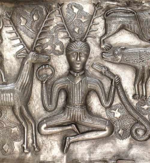 The antlered figure on an inner plate.