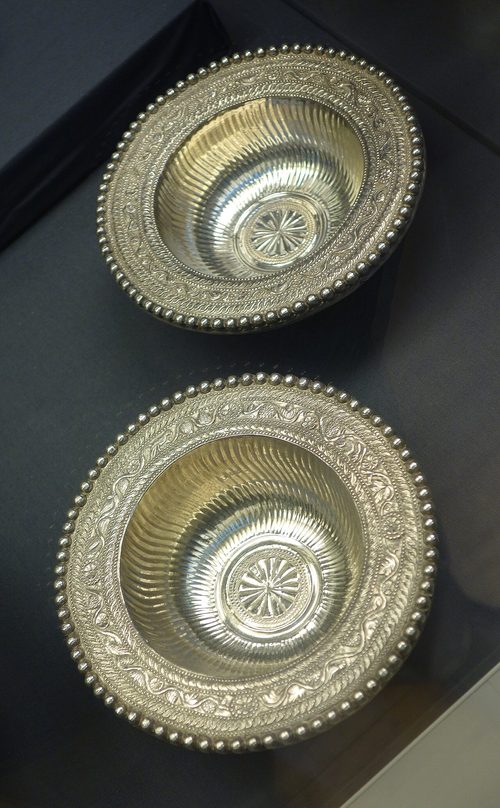 Pair of small flanged bowls with beaded rims, British Museum.