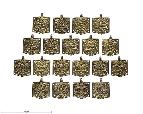 The nineteen gilt belt mounts of eastern type. Swedish History Museum.
