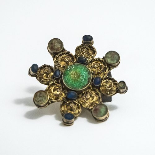 Star-shaped brooch set with stones, from the Colmar Treasure, Musée Unterlinden, Colmar.