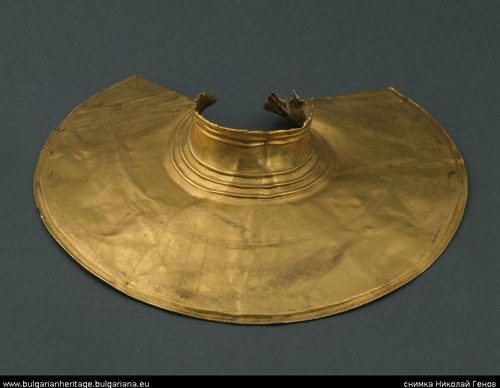 One of the domed gold discs.