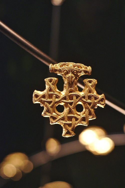 One of the large cross-shaped pendants with its bird's-head top, Stralsund Museum.