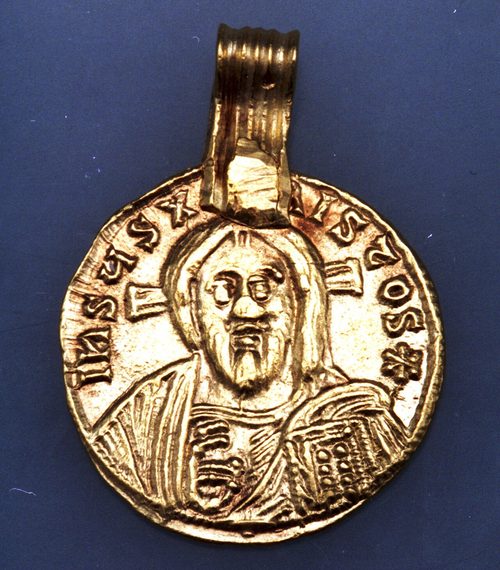 A gold coin with a loop added to wear as a pendant. Museum of Cultural History, Oslo.