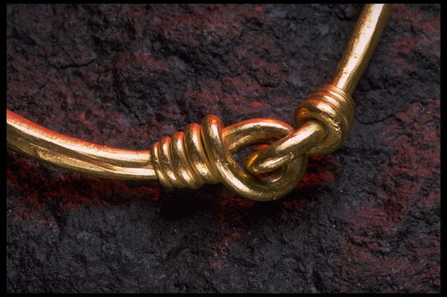 Detail of the stamped crescent decoration on the neck-ring.