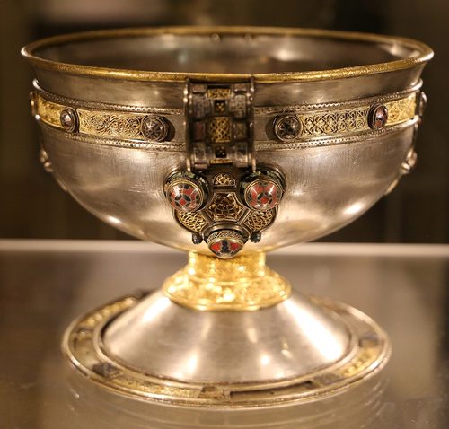 The Ardagh Chalice from the side, showing a handle escutcheon and the filigree girdle. National Museum of Ireland.