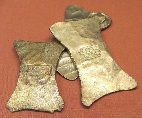 Late Roman double-axe silver ingots, one stamped EX OFFI ISATIS, from the Tower of London, Reculver and Richborough.