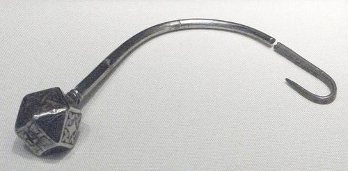 The knotted head of the silver scourge from Trewhiddle. British Museum.