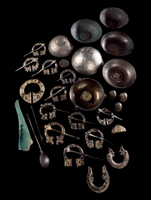 The whole St Ninian's Isle Treasure: bowls, brooches, sword fittings and the porpoise jawbone. National Museum of Scotland.