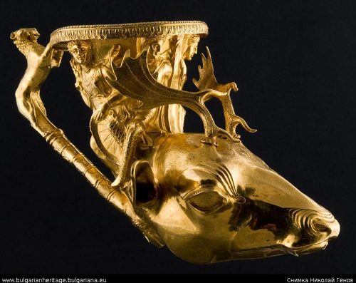 A rhyton ending in the forepart of an animal.
