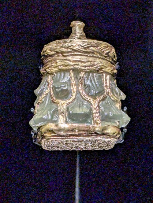 The rock crystal jar in its gold mount, inscribed for a Bishop Hyguald.