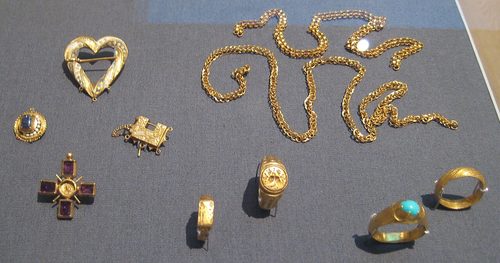 Rings, brooch, padlock pendant and gold chains from the Fishpool Hoard, British Museum.