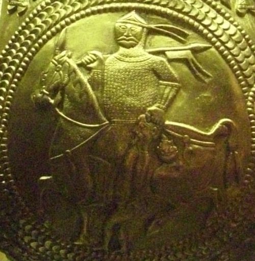 The 'victorious prince' medallion: a horseman dragging a captive by the hair.